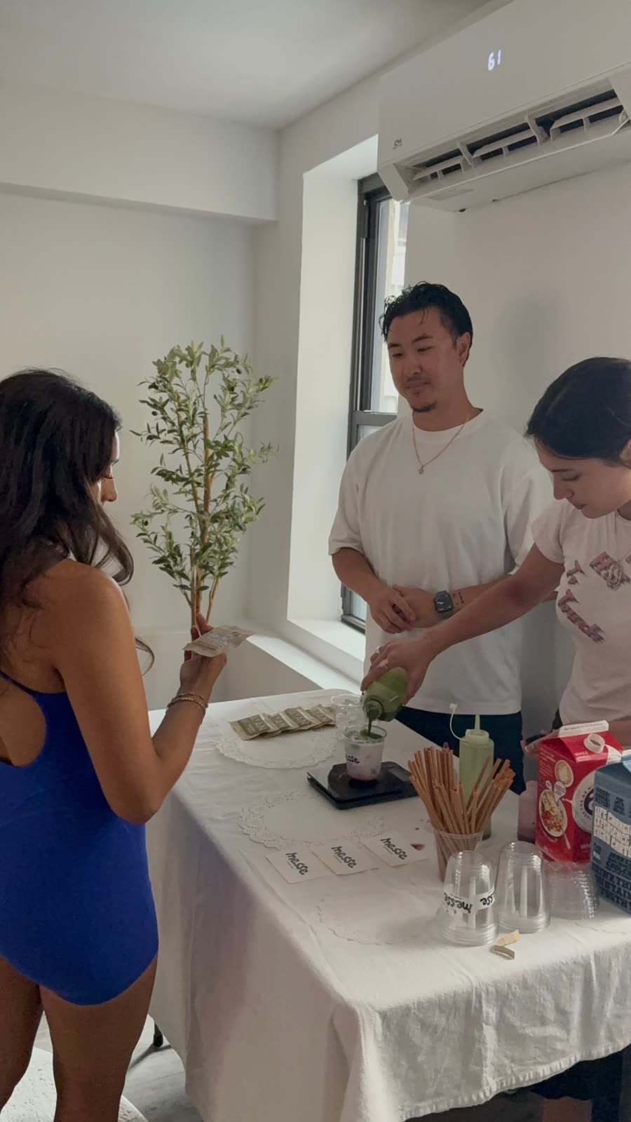Guests gathered around the matcha bar at a private event